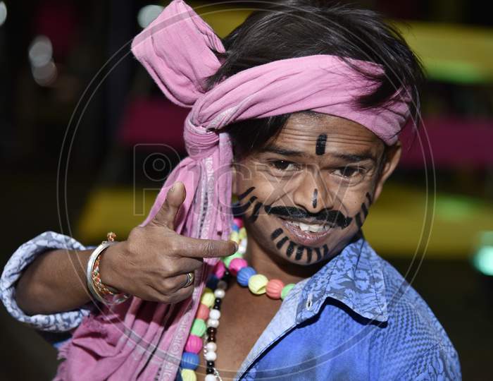 A Folk Artist Makeup To an  Assamese Boy During Bihu Festival Celebrations in Guwahati