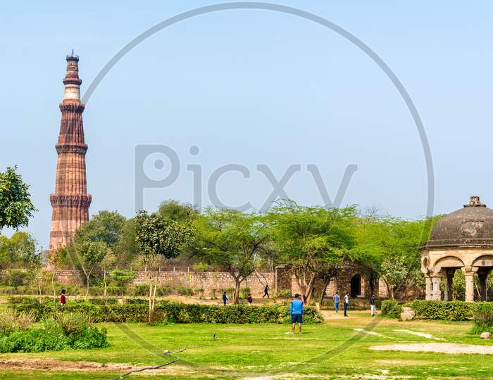 Qutb Minar And Chhatri At The Quli Khan Tomb. Delhi, The Capital Of India