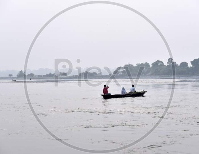 People Crossing Manas River To Home After Work, In Baksa District Of Assam