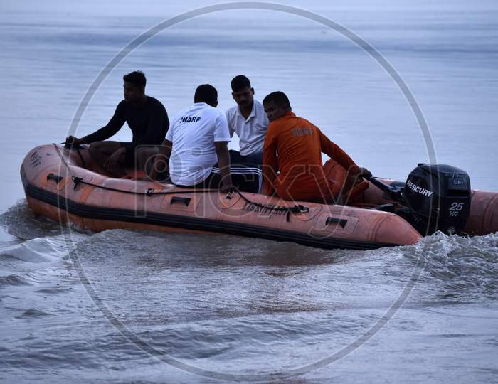 National Disaster Response Fund (Ndrf) Personal In A Search Operation After A Boy, Roushan Basfore(14), Drowned In The Brahmaputra River, In Guwahati,Assam, India On 22 September 2019.