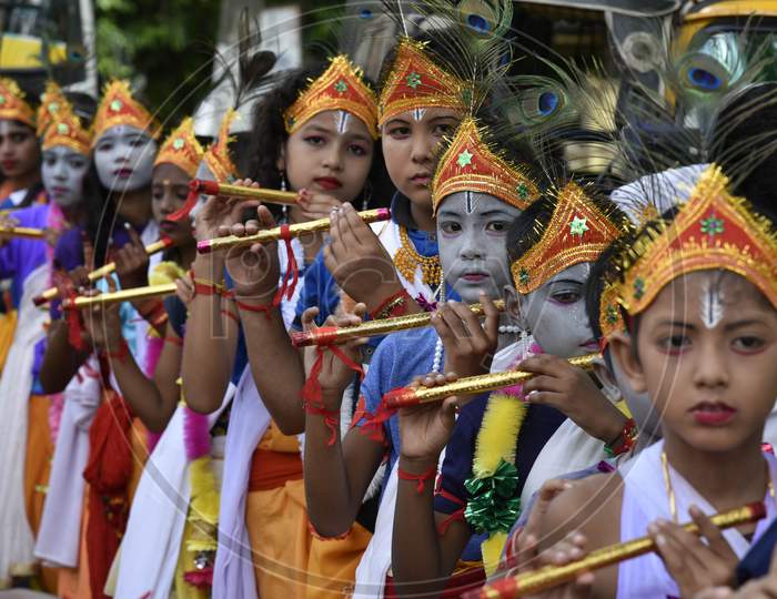 Little Children Dressed Up As Lord Krishna During The Janmashtami Festival In Morigaon, Assam, India