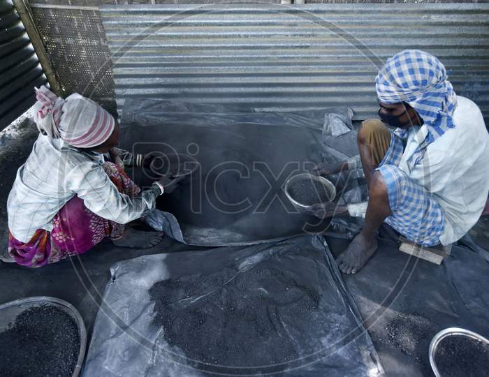 Workers Preparing Gunpowder In A Firecracker Workshop Ahead Of Diwali Festival, In Barpeta, Assam