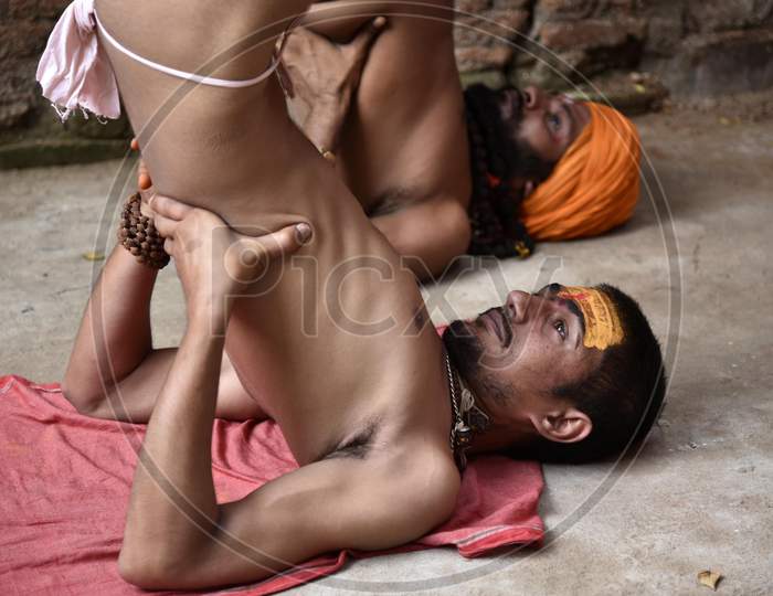 Hindu Monk(Sadhu) Perform Yoga To Mark International Yoga Day At Kamakhya Temple In Guwahati, Assam, India
