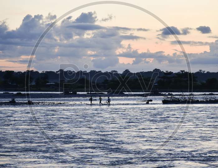Silhouette of Fisherman Ob Bramhaputra River In Guwahati