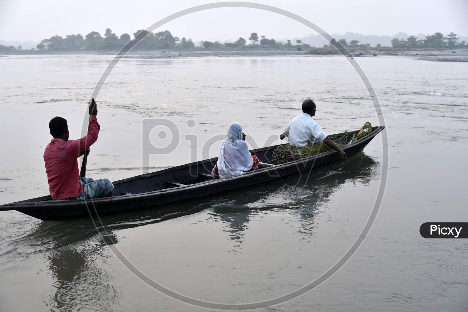 People Crossing Manas River To Home After Work, In Baksa District Of Assam