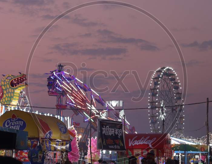 Fair With Giant Wheel and Amusement Events