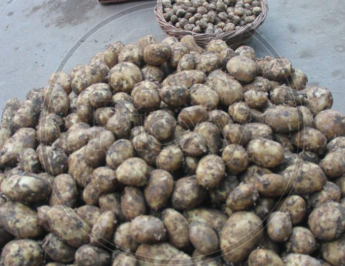 Freshly Harvested Potatoes In an Vegetable Vendor Stall