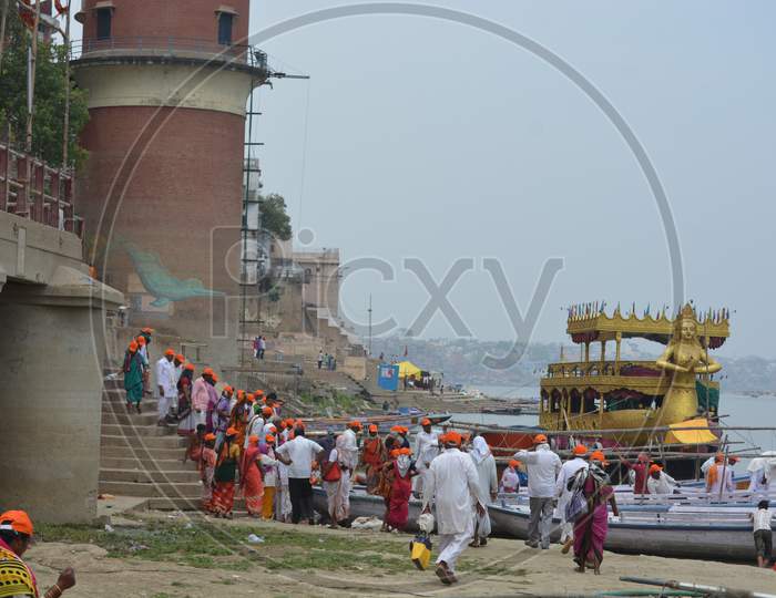 devotees Taking Boat Rides in Ganga River in Varanasi