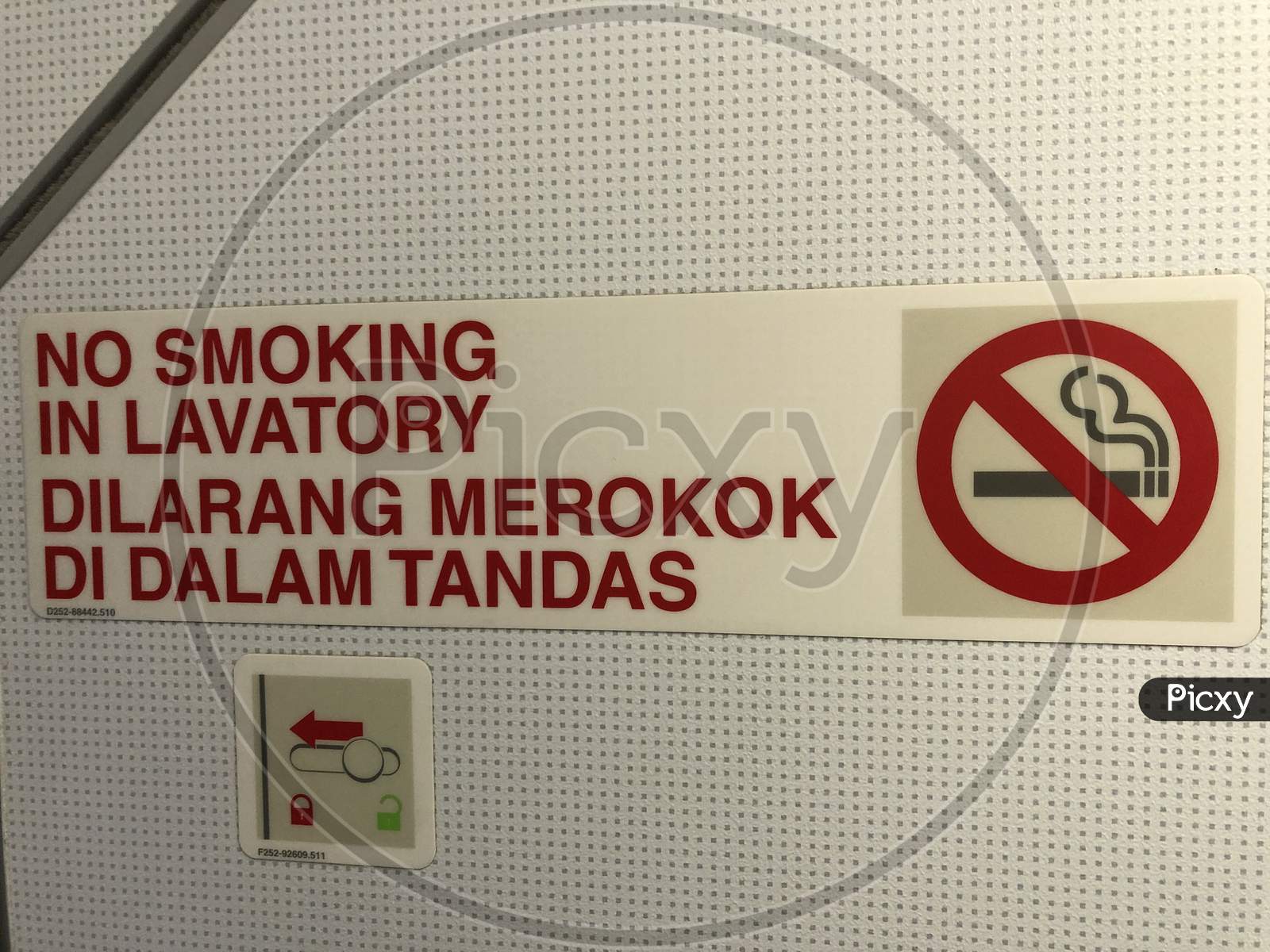 No Smoking Board inside a washroom in flight.