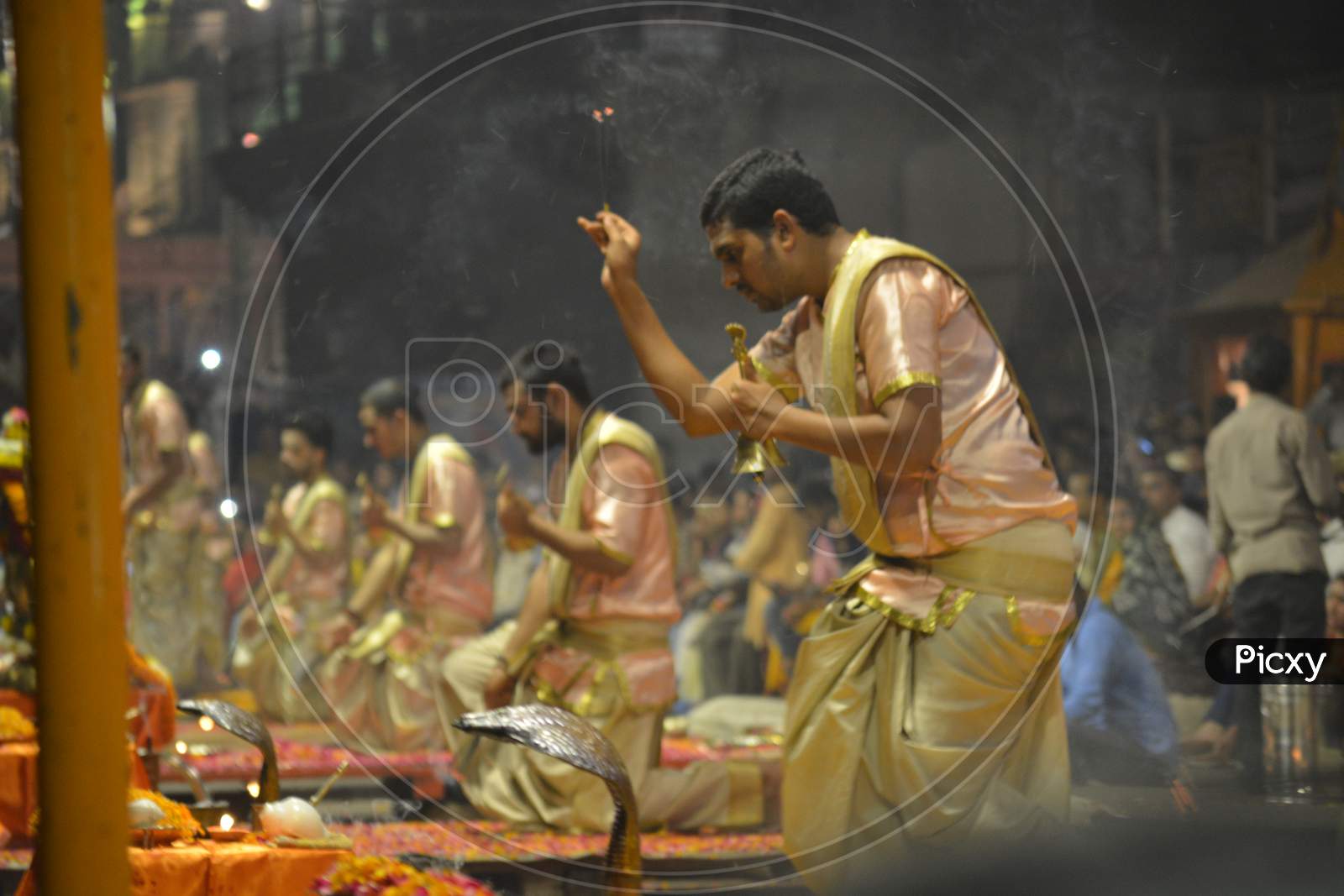 Priests Performing Ganga Aarthi In Varanasi Ghats