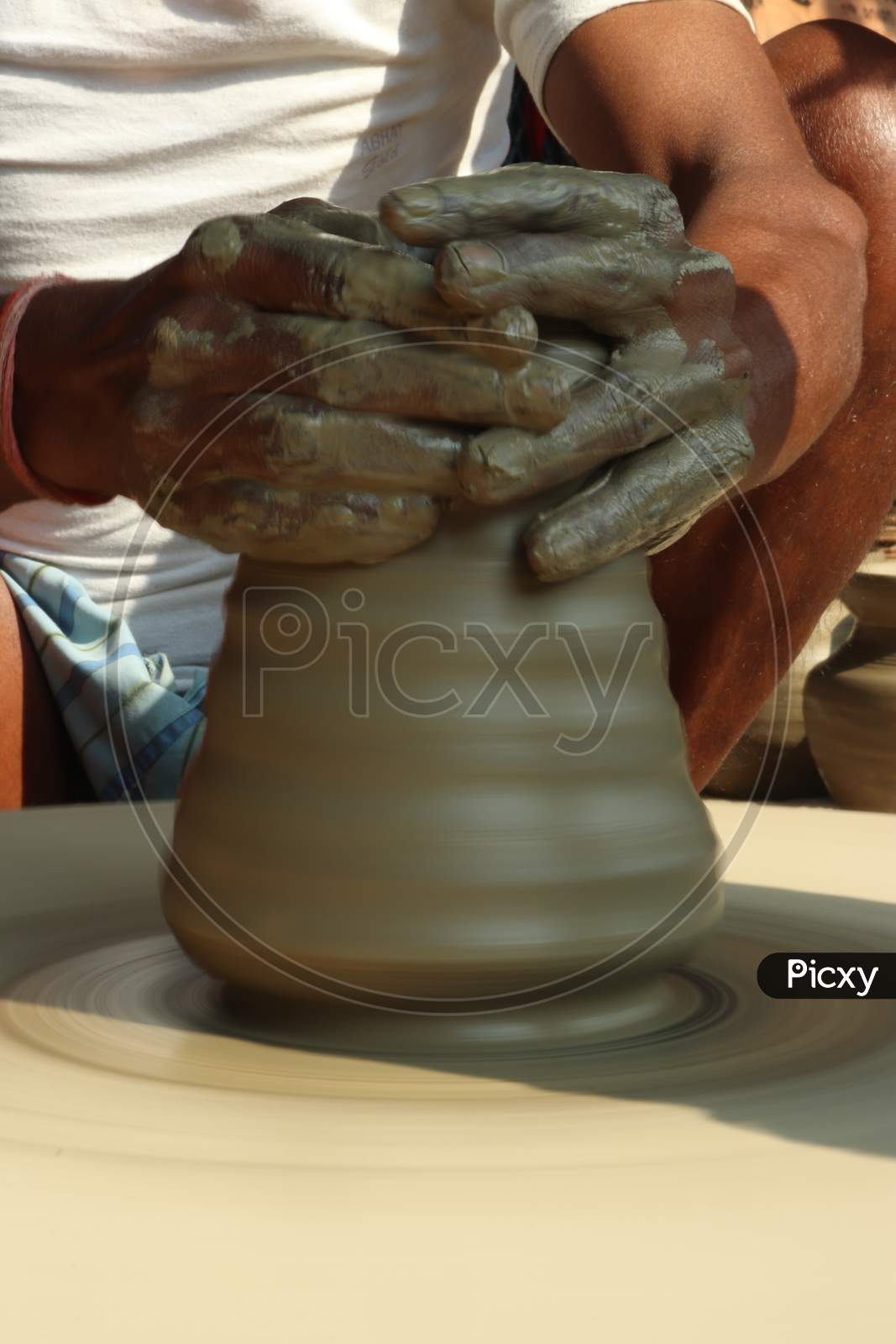 A Potter Making Pots From Clay In Rural Villages