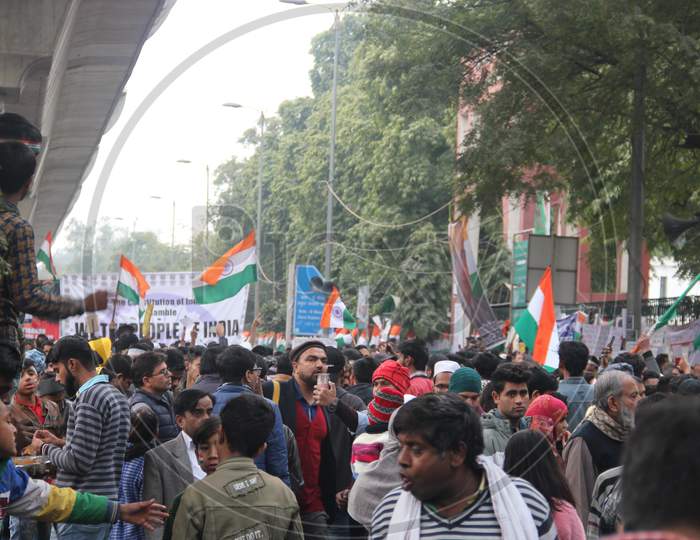 Indian People Protest Against CAB, CAA And NRC  By  Holding  Indian National Flag And Placards
