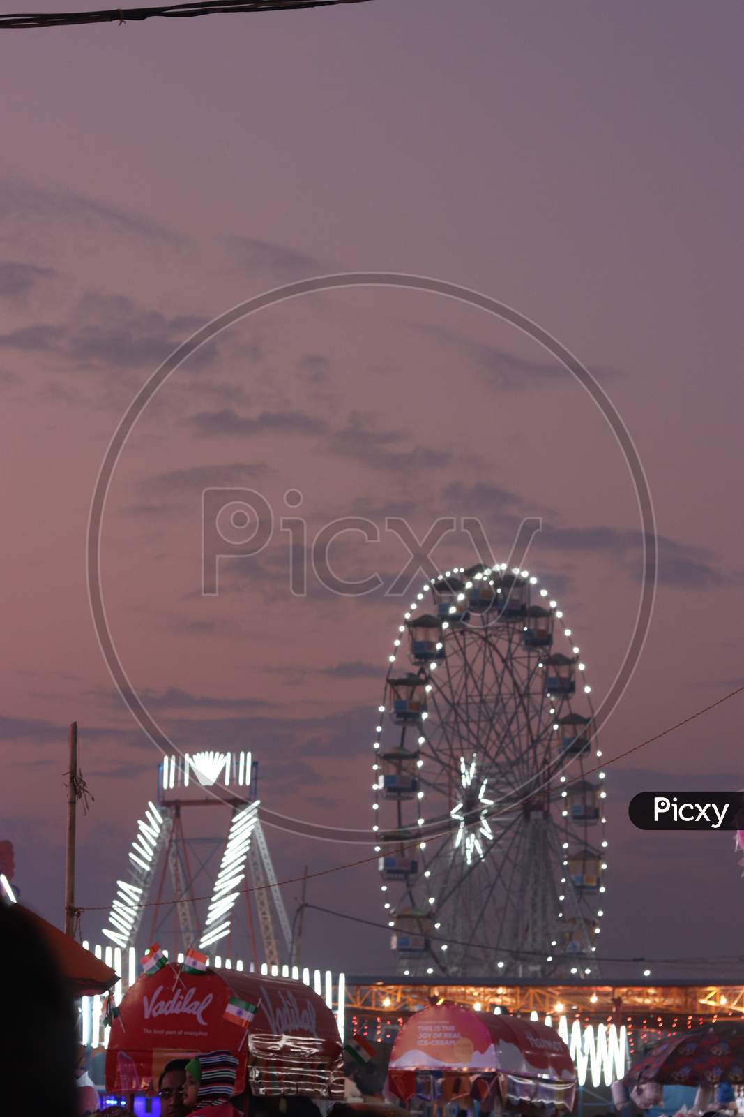 Fair With Giant Wheel and Amusement Events