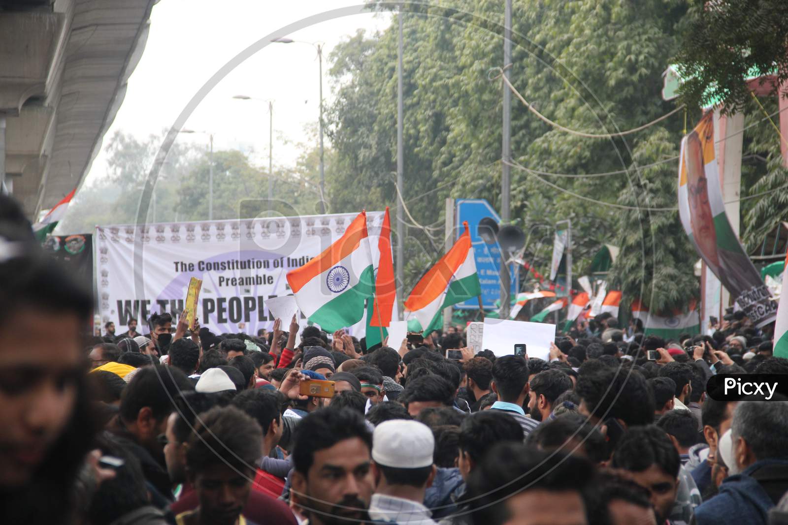 Indian People Protest Against CAB, CAA And NRC  By  Holding  Indian National Flag And Placards