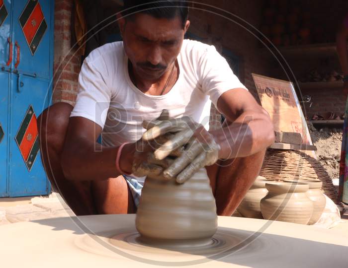 A Potter Making Pots From Clay In Rural Villages