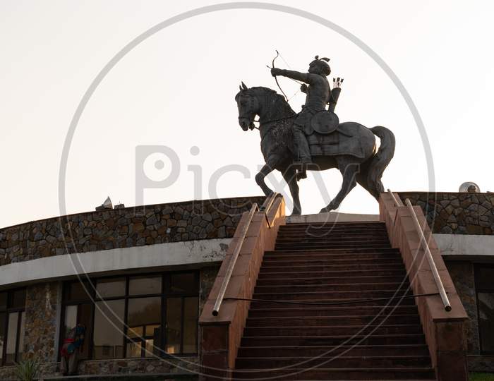 Statue of Prithviraj Chauhan over Delhi public library at Qila Rai Pithora complex