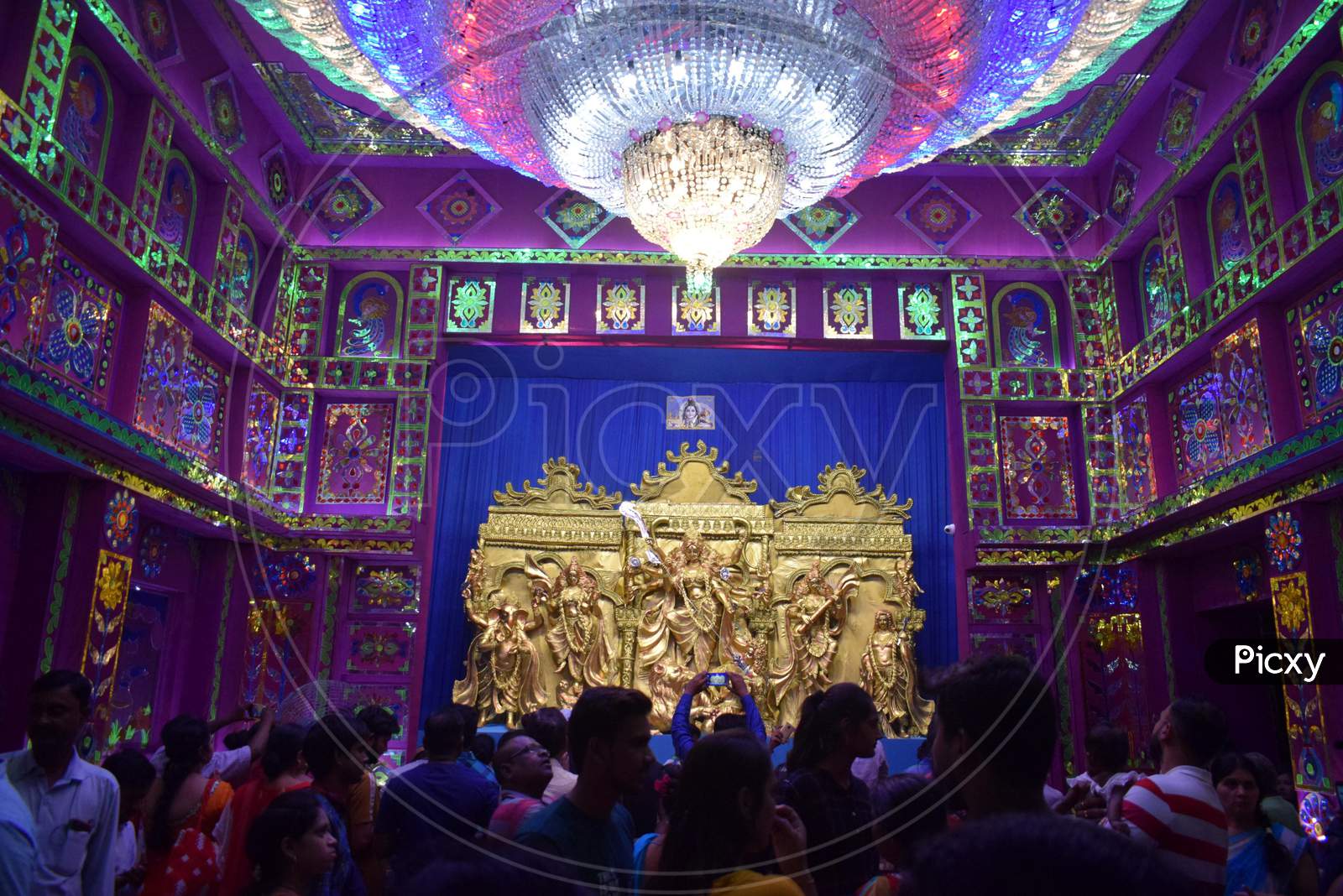 Hindu Devotees Take Blessing In Front Of The Idol Of Hindu Goddess Durga,In A 'Pandal' Ahead Of ' Dussehra' Festival. 'Dussehra' Is A Hindu Festival That Celebrates The Victory Of Good Over Evil,In Prayagraj