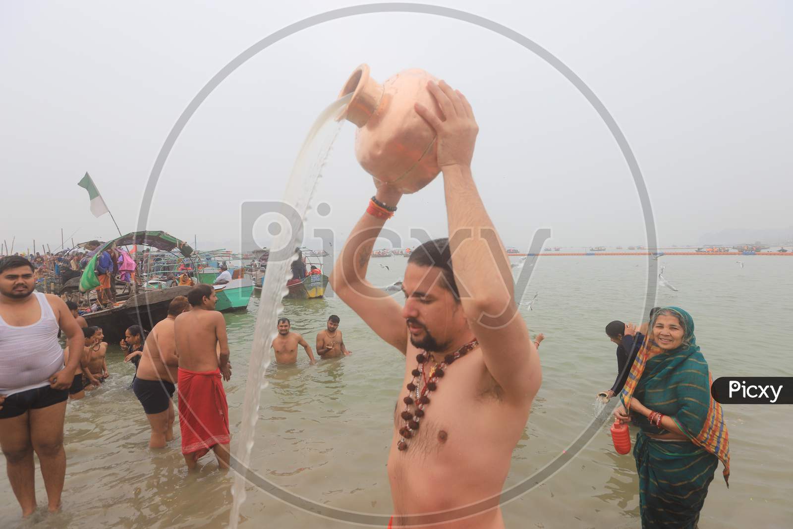 Hindu Devotees Taking Holy Bath In River Ganga In Prayagraj