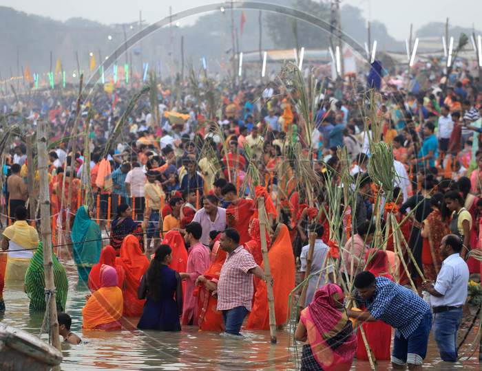 Hindu Women Devotees Offering Chhath Puja During Chhath Festival On The River Bank Of Yamuna In Prayagraj