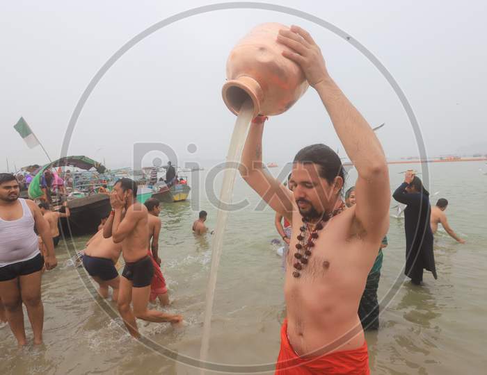 Hindu Devotees Taking Holy Bath In River Ganga In Prayagraj