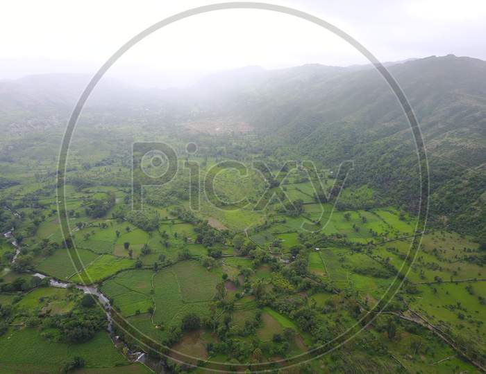Aerial View of Mountains covered with greenery
