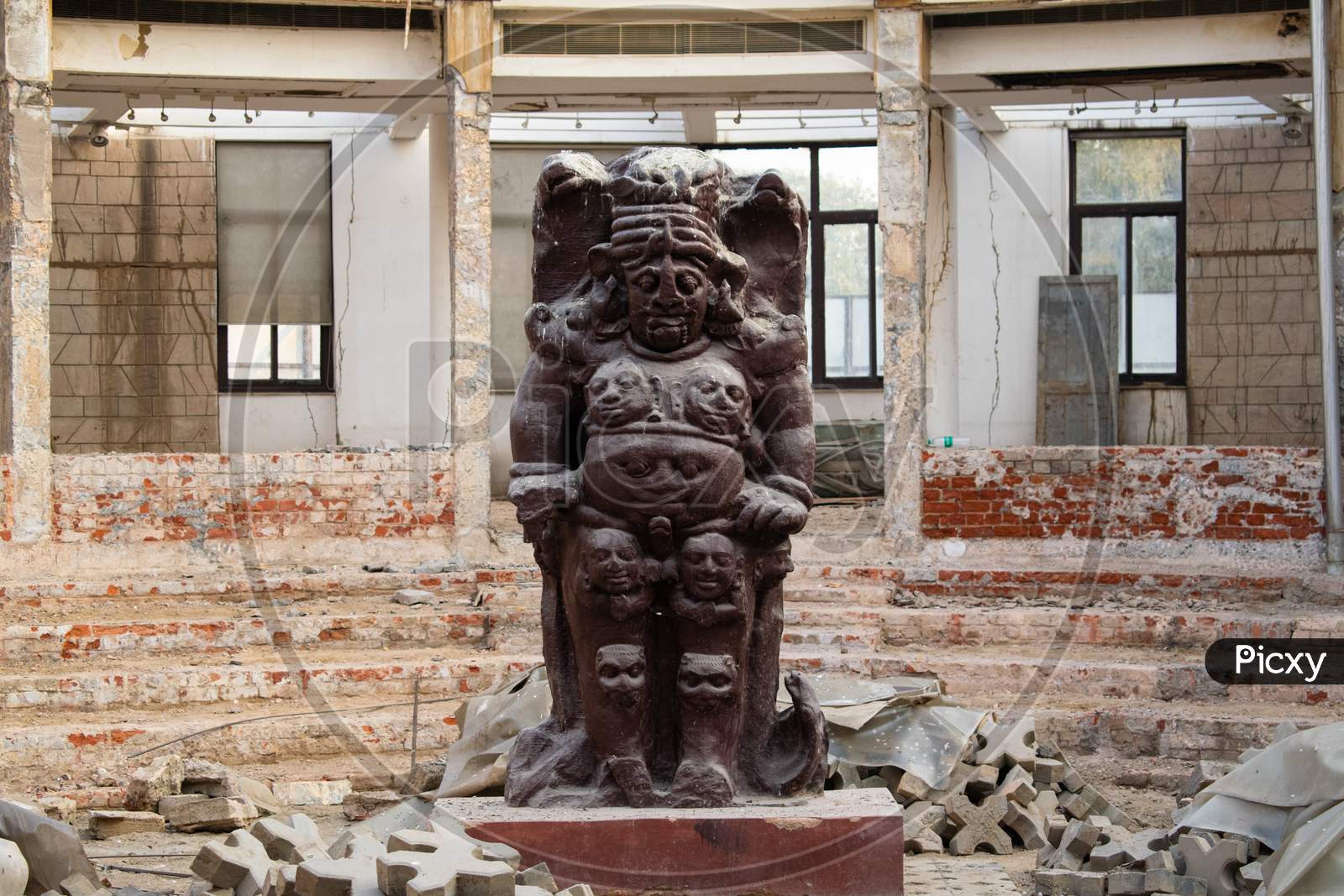 Some construction work and a statue at Delhi Public Library at Qila Rai Pithora
