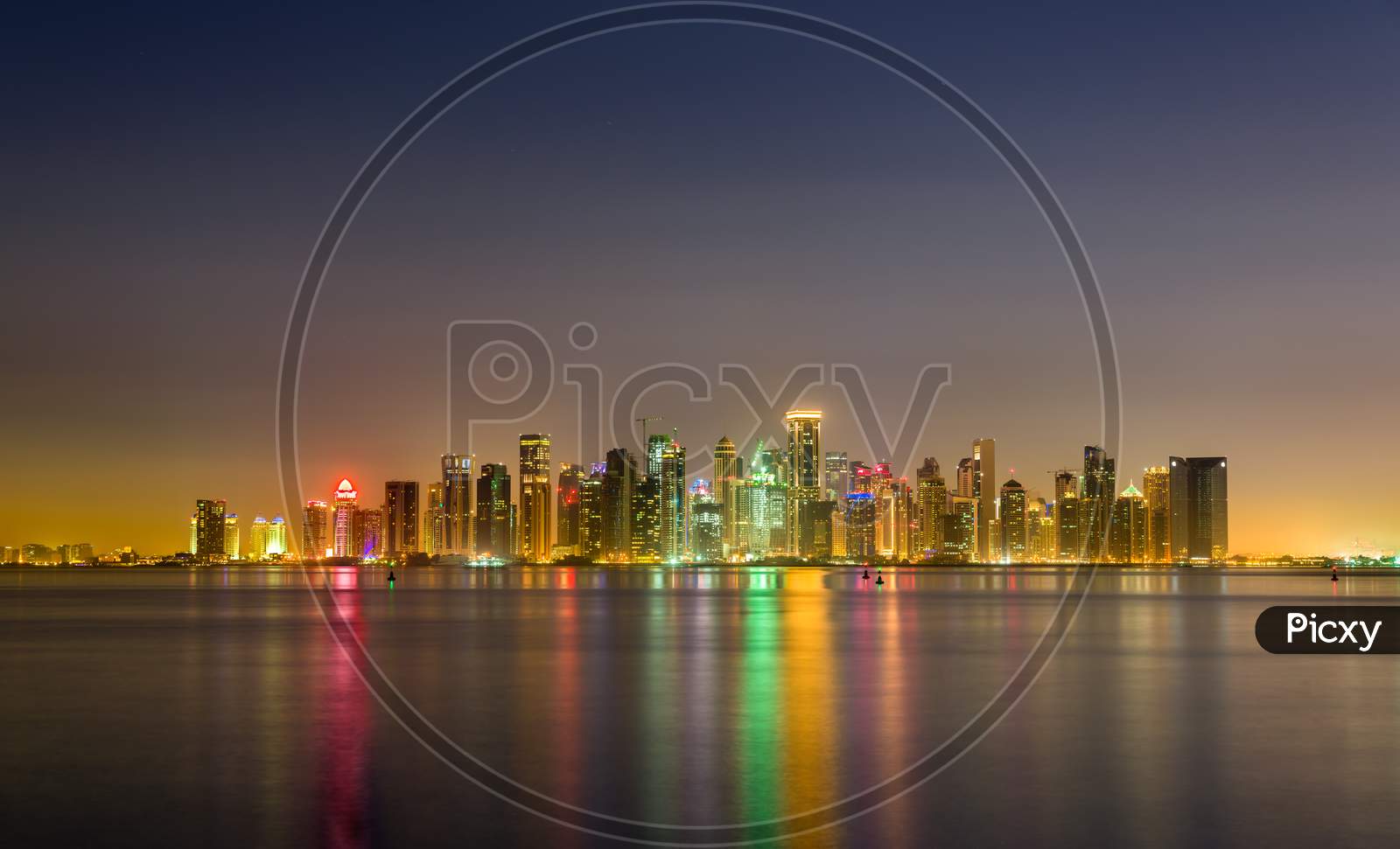 Skyline Of Doha At Night. The Capital Of Qatar