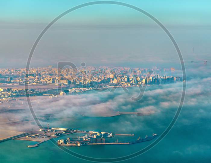 Aerial View Of Doha Through The Morning Fog - Qatar, The Persian Gulf