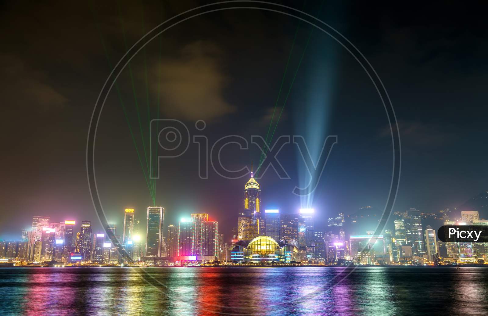 Hong Kong Skyline At Night With A Laser Light Show. China