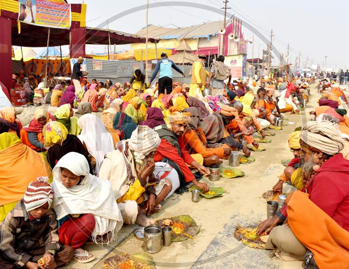 Hindu Sadhu Or Baba Eating Lunch  in Prayagraj During Ardh Kumbh Mela in Allahabad