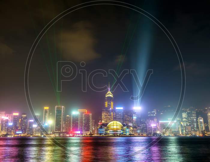 Hong Kong Skyline At Night With A Laser Light Show. China