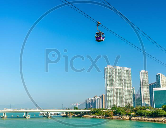 Cable car above Tung Chung Bay in Hong Kong on Lantau Island - China.