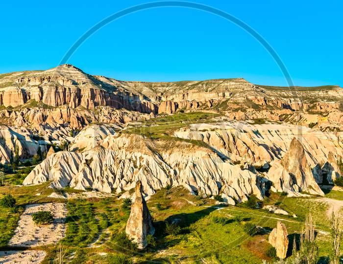 Rock Formations Of Rose Valley At Goreme National Park In Turkey