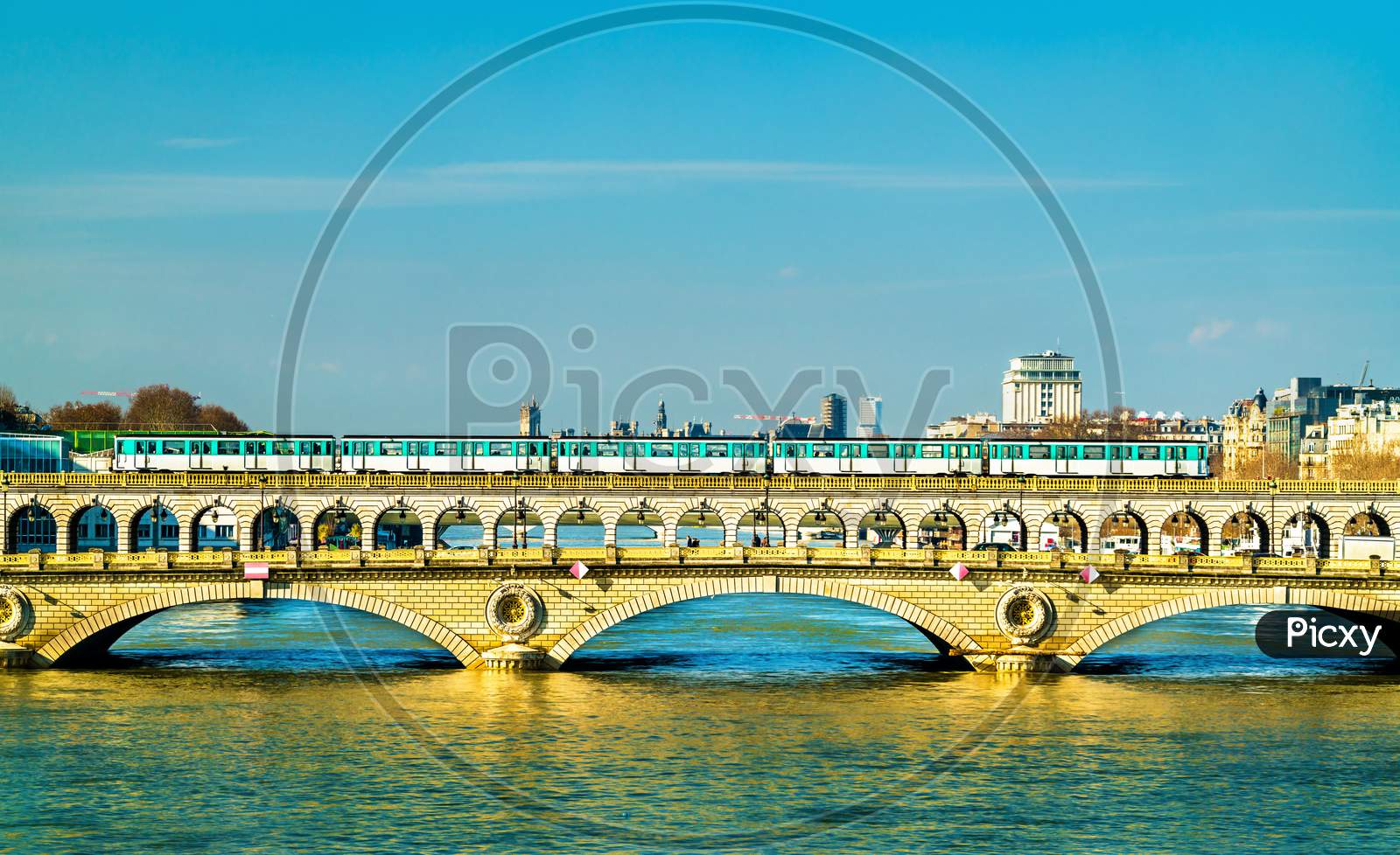 Metro Train On The Pont De Bercy, A Bridge Over The Seine In Paris, France