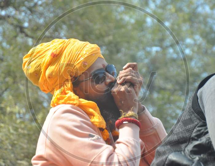 Hindu Baba Or Sadhu Smoking Weed or Ganja During Ardh Kumbh Mela in Prayagraj