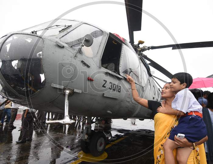Visitors Watching the Indian Air Force Helicopters During Expo In Guwahati, Assam