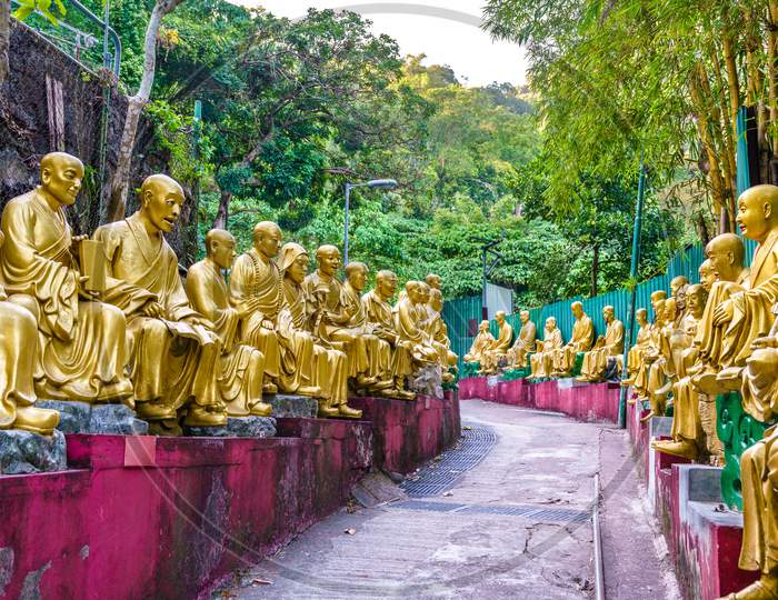 Statues On The Way To The Ten Thousand Buddhas Monastery In Hong Kong