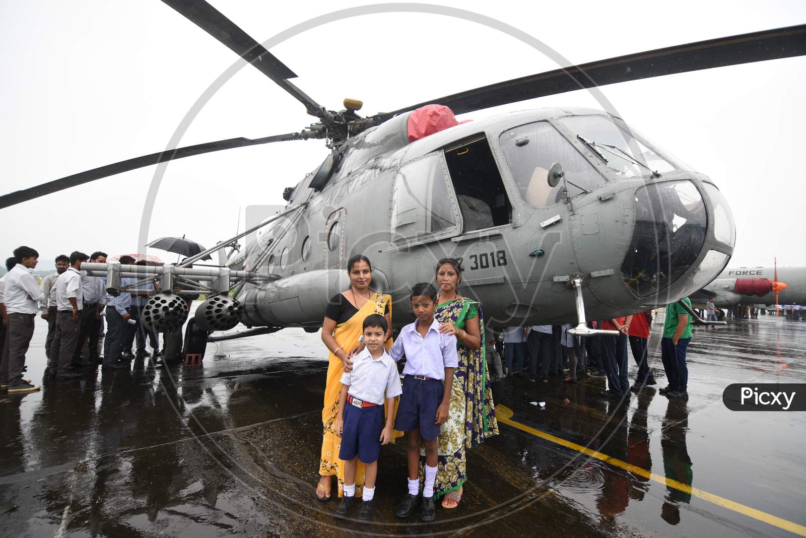 Visitors Watching the Indian Air Force Helicopters During Expo In Guwahati, Assam