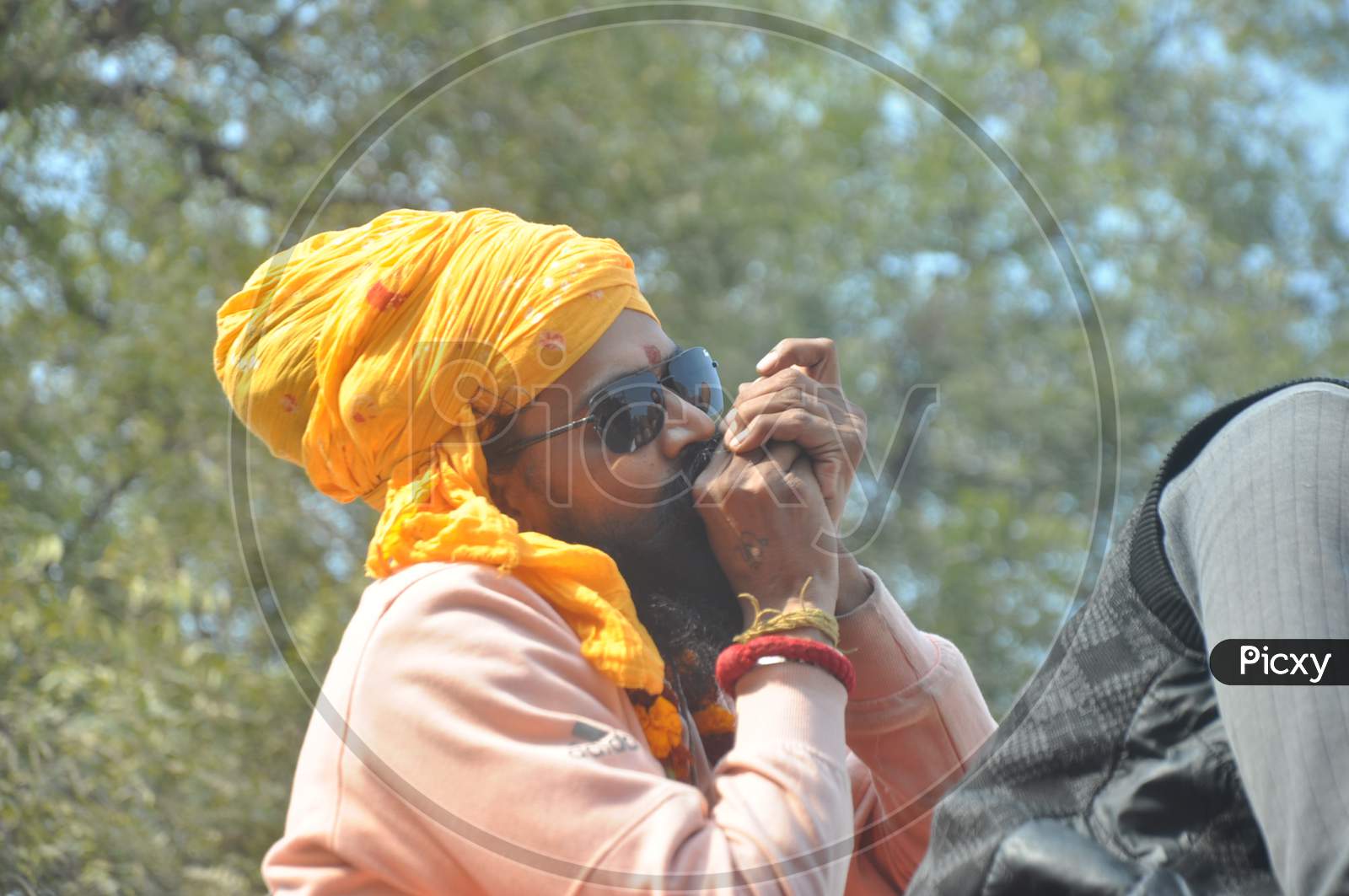 Hindu Baba Or Sadhu Smoking Weed or Ganja During Ardh Kumbh Mela in Prayagraj