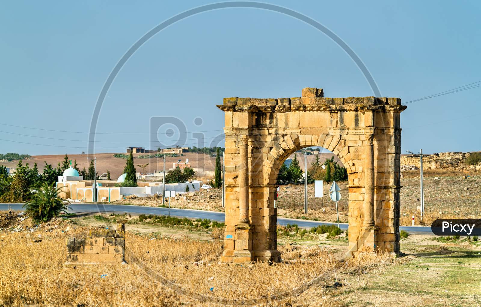 Ancient Roman Triumphal Arch In The Tunisian Countryside Near Dougga And Al Karib