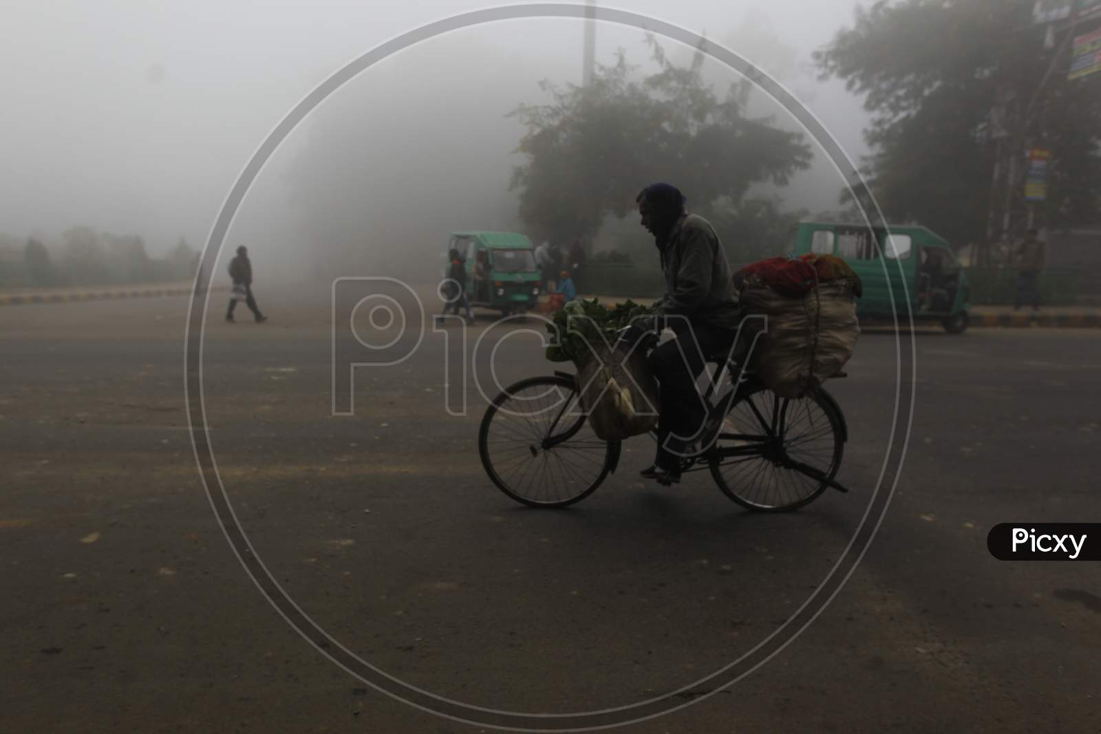 People in Foggy Roads in Winter Mornings