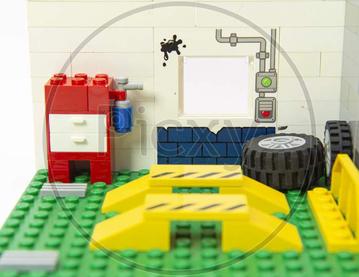 Florianopolis, Brazil. September 19, 2020: View Of Interior Of Empty Auto Repair Garage Made By Lego. Concept Of Mechanical Workshop For Repair And Maintenance Of Car Or Motorbikes.