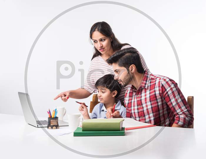 Online School In India Concept - Cute Little Son Taking Parent'S Help In Studies Or Homework