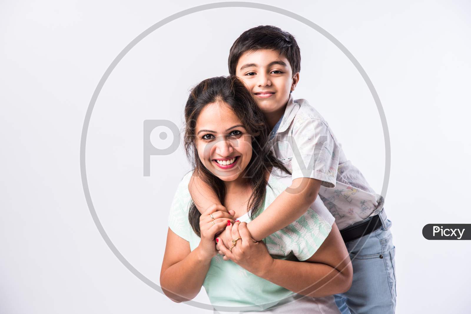 Indian Pretty Young Mother And Little Boy Or Son Embracing On White Background