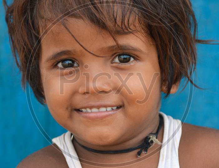 TIKAMGARH, MADHYA PRADESH, INDIA - SEPTEMBER 14, 2020: Portrait of a happy smiling child girl.