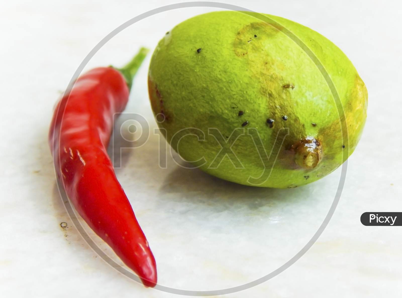 Green mango and red chilli