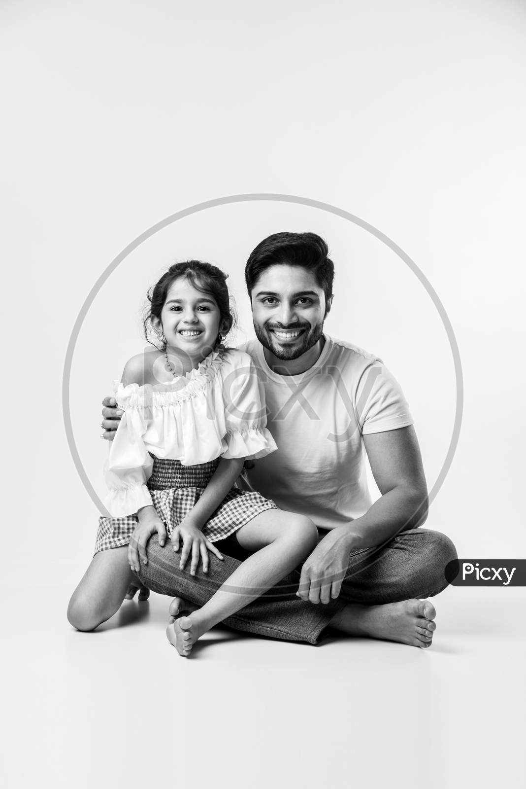 Father'S Day Concept - Indian Young Dad With Cute Little Daughter Against White Background