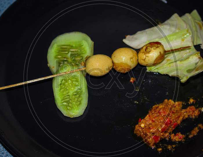 Indonesian food: quail eggs satay