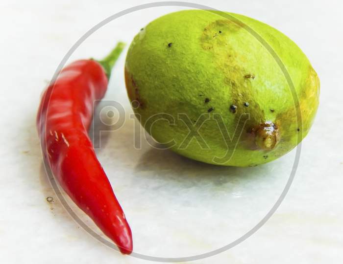 Green mango and red chilli