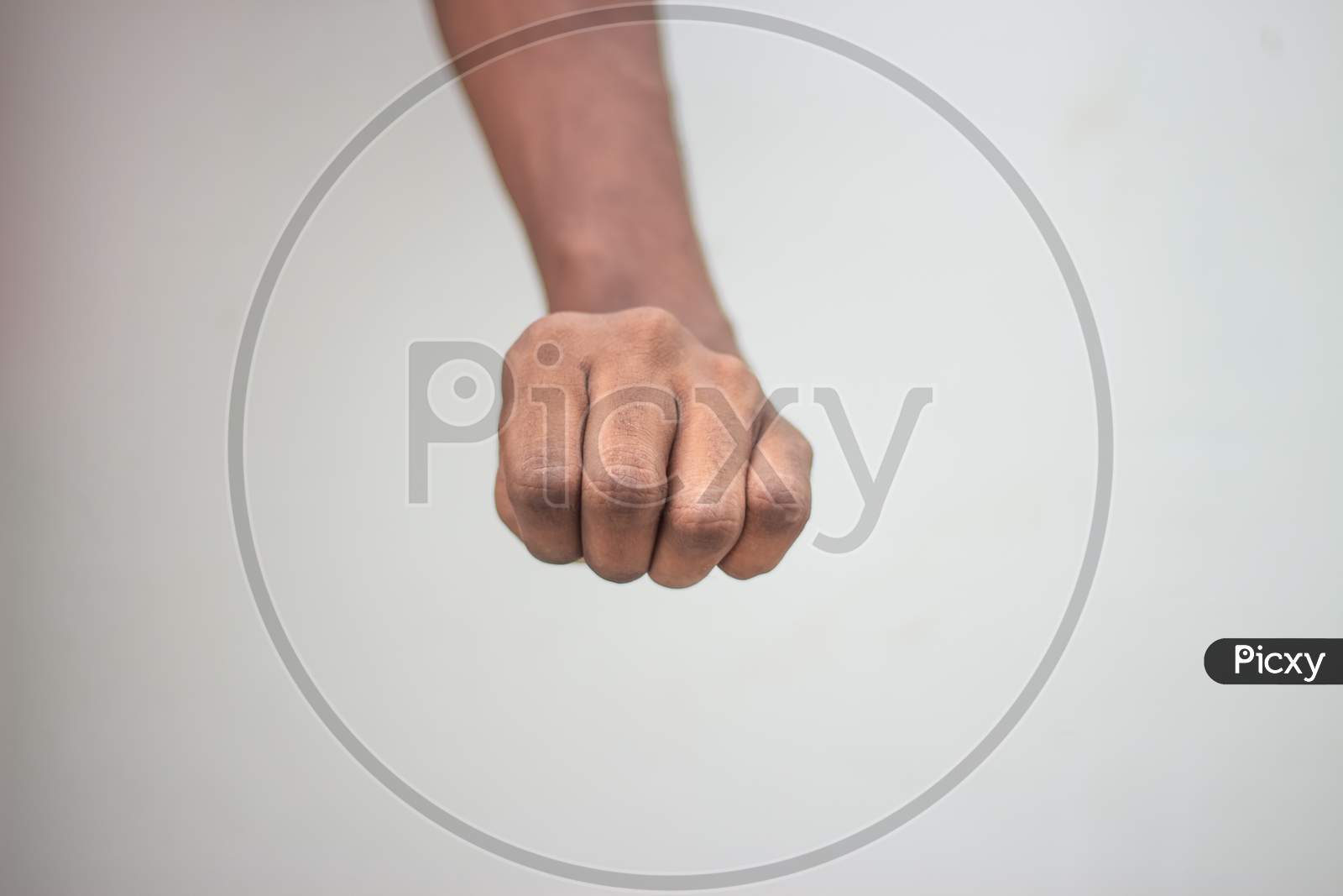Stone Paper Seser Symbol - Male Showing Stone Sign Hand Isolated On White Background..Man Close All The Hand Fingers.